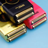 MRD Pro Vector foil shaver foil heads in black, gold and pink, close-up