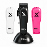 Black MRD HC-3969X clipper on one charging stand with white and pink replacement front covers aligned beside the black front cover
