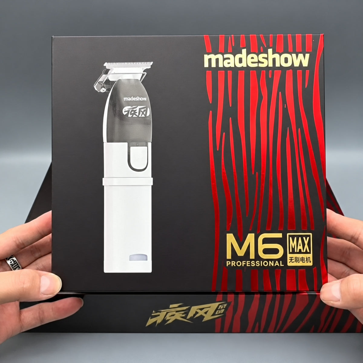M6 MAX retail packaging with the white T-blade trimmer printed on the box