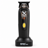 MRD X-Pro Professional Vector Motor Trimmer in black, front view on charging stand