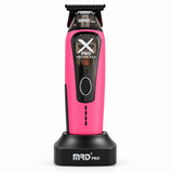 MRD X-Pro Professional Vector Motor Trimmer in pink, front view on charging stand